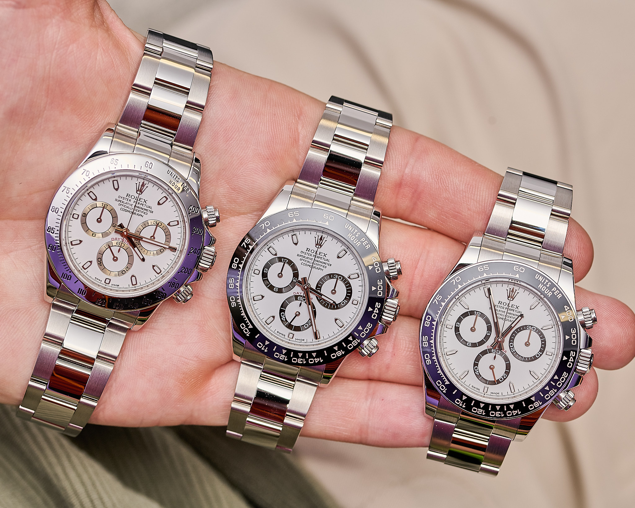 Three Rolex watches.