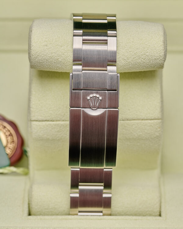 The Rolax logo on the strap of a Rolex Explorer