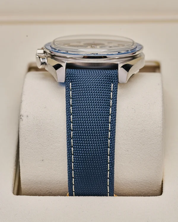 The strap of a Omega Speedmaster “Silver Snoopy Award” 2025